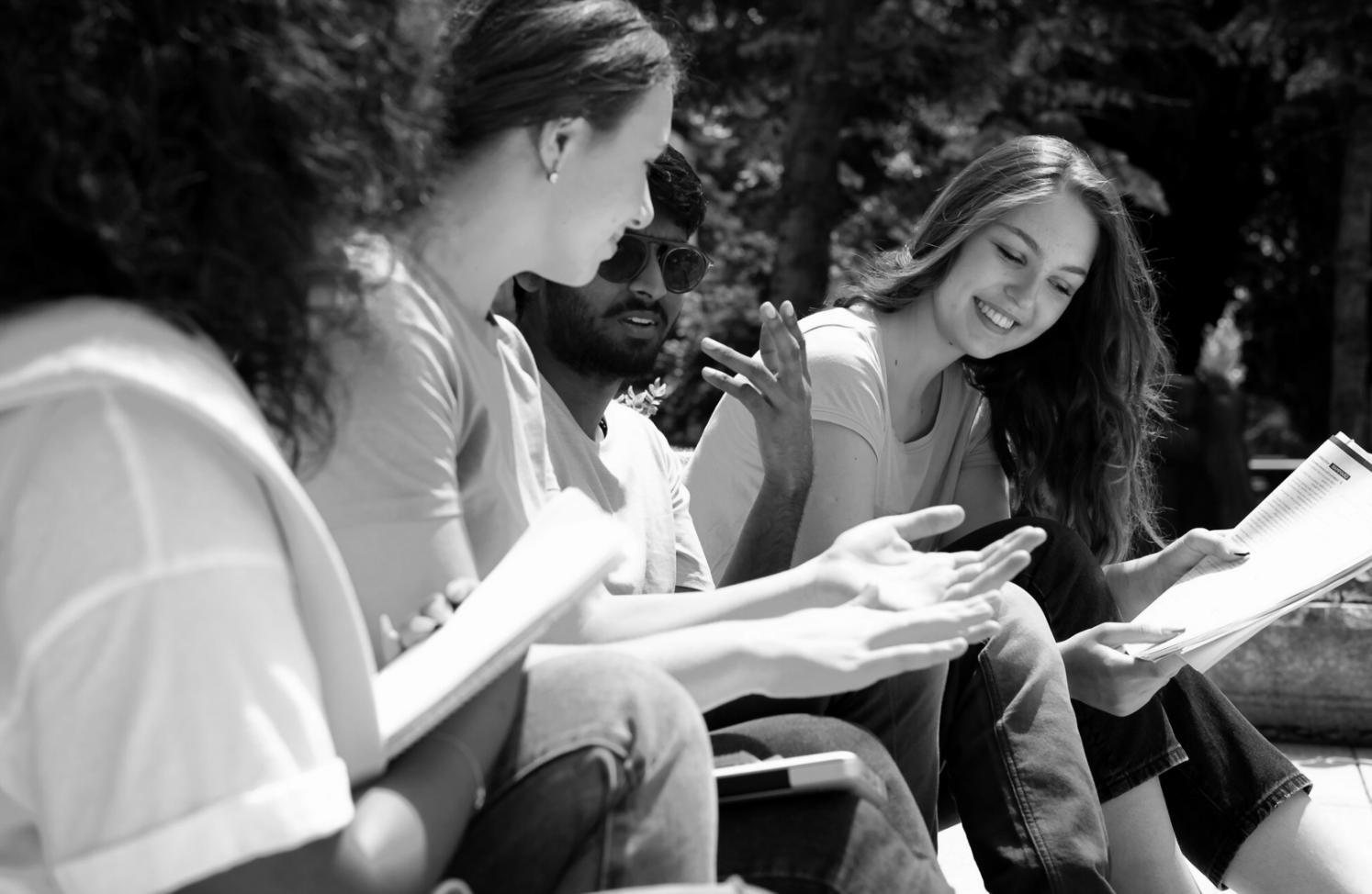 Students collaborating in an interactive English learning environment